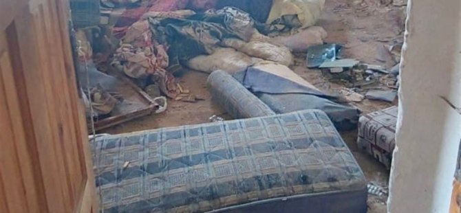 Kötü koku yayılan evden 1 kamyon dolusu çöp çıktı