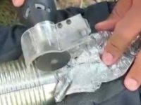 Kafası konserve kutusuna sıkışan kediyi, itfaiye kurtardı 
