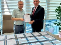 Başkan Şeyhi Odakır, Arsaların tapularını teslim aldı